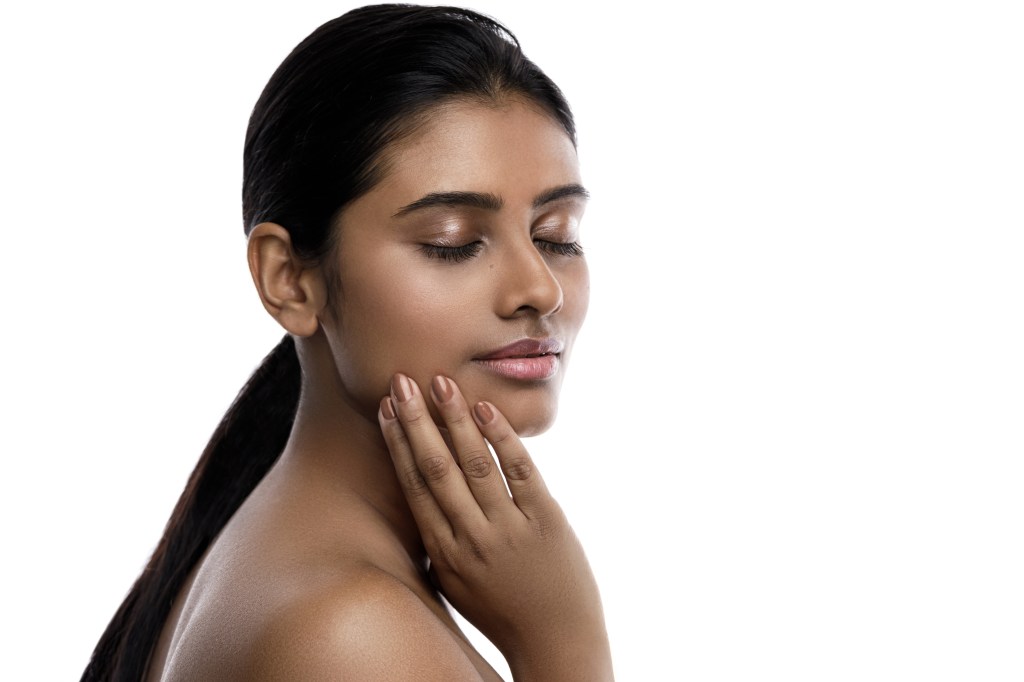 Indian Woman Model Posing. Long Straight Virgin Hair Brown glowing skin Indian woman with long straight virgin hair. Curls overview and selection blog at www.WigMakingBlog.com